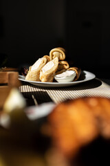 Rolls with cottage cheese. Served with sour cream. Tasty