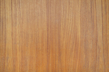 Naklejka premium Vertical grained wood board texture background. Brown wood grain veneer backdrop.