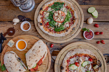 Serving a tasty supreme pizzas, food photography recipe idea