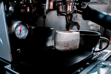 coffee machine pouring espresso