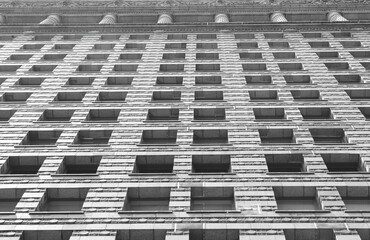 Black and white worm's eye view of art deco building
