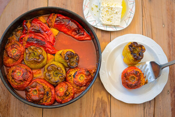 Greek traditional food Gemista already cooked in the oven. Stuffed peppers, tomatoes, zucchini with...