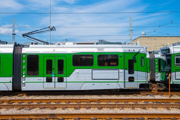 Obraz premium Boston Metro MBTA Green Line Type 9 modern fleet by CAF USA at Riverside terminal station, Newton, Massachusetts MA, USA.