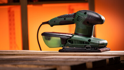 Electrical sander in a workshop