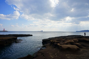 a beautiful seaside landscape with charming clouds