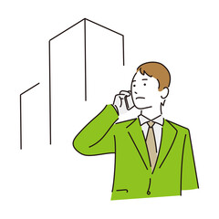 電話をかけているビジネスマン