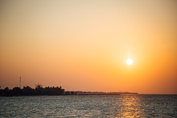 Naklejka premium sunset over the sea