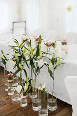Luxurious floral arrangement with lilies in the restaurant.