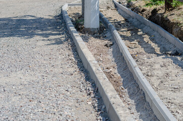 Construction of a new road, sidewalk, storm drainage. Pedestrian