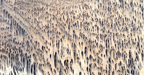 Afghan women ,    abstract photography of the deserts of Africa from the air. aerial view of desert...