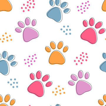 Cute seamless pattern with colorful pets paws. Cat or dog footprint outline bright background with dots.