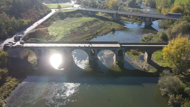 Aerial view of Nineteenth-century bridge over the Yantra River, known as the Kolyu Ficheto Bridge in Byala, Ruse region, Bulgaria