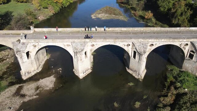 Aerial view of Nineteenth-century bridge over the Yantra River, known as the Kolyu Ficheto Bridge in Byala, Ruse region, Bulgaria