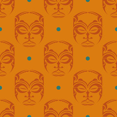 Orange seamless pattern with masks of the Polynesian tribes.