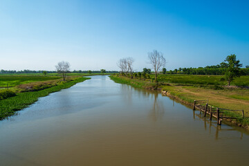 Beautiful rural location, Canals and grasslands with blue sky
