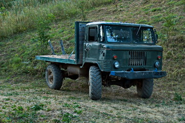 Old military truck, adapted and used for transporting wood from the forest, Vasilyovo, Bulgaria  