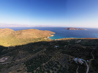 Fototapeta na wymiar panoramic view of the Greek landscape with mountains and sea of Crete island filmed from a drone