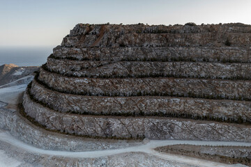 panoramic view of the white mountains with mining and equipment filmed from a drone 