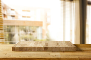 Wooden pedestal of free space for your decoration and blurred window background 