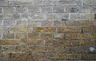 Wall texture.. Ancient wall of yellow brick