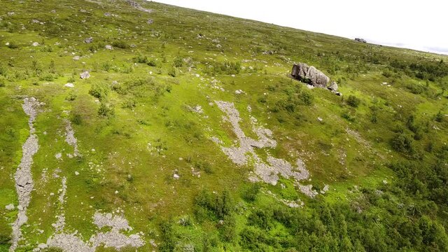 Drone footage of the hiking trail to Skierfe mountain top near Aktse, July in Swedish Lapland.