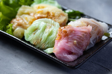( Kow Griep Pag Mor)Pork Steamed Rice Parcels.