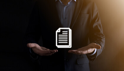Businessman man holding a document icon in his hand Document Management Data System Business Internet Technology Concept. Corporate data management system DMS