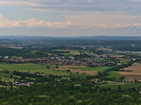 Aerial view of landscape with small village Nabern, part of Kirchheim unter Teck, Baden-W&uuml;rttemberg, Germany, surrounded by agricultural fields.