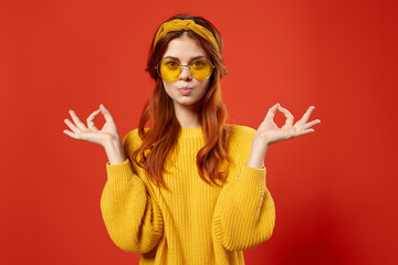 cheerful woman in yellow glasses with a bandage on her head moda Studio emotions
