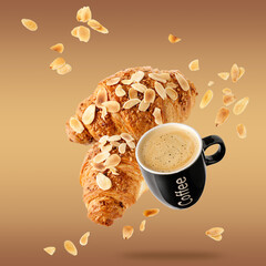 Fresh baked almond  breakfast croissants  with nuts crumbs and black cup hot espresso coffee flying...