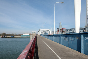 Obraz premium The Stadsbrug is a road bridge over the Oude Maas that connects the cities of Dordrecht and Zwijndrecht, Zuid-Holland province, The Netherlands