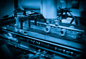 The offset press in the production process is in the printing factory