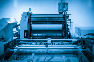 The offset press in the production process is in the printing factory