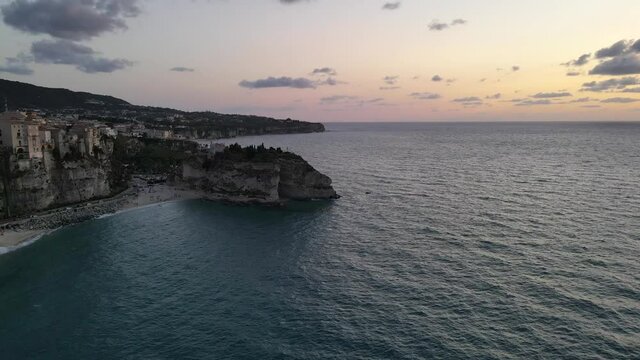flying over Tropea cost at sunset time