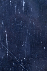 Blue concrete painted wall with white paint splatters. Artistic grunge background