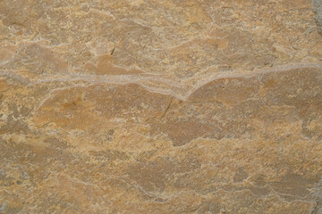 Sandy color stone texture. Rough weathered aesthetic backdrop.