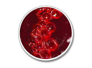 An illustration of a round die cut sticker mock up. The sticker has an image of red bubbles in liquid.