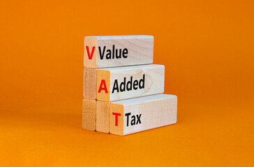 VAT, value added tax symbol. Wooden blocks with concept words 'VAT, value added tax'. Beautiful...