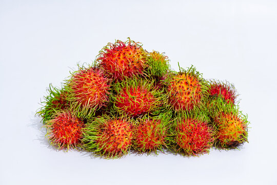 bright red Lambutan on a white background