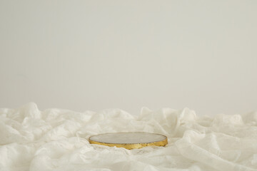 Marble podium with gold on the white background. Podium for product, cosmetic presentation....