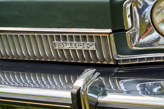 Buick detail shot of the classic car from the General Motors group with grille and chrome bumper in Lehnin, Germany, August 21, 2021