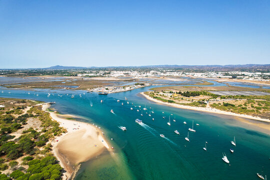 Aerial view of the Tavira Island beach, a tropical island near the town of Tavira, part of the natural park of Ria Formosa in Algarve region of south Portugal