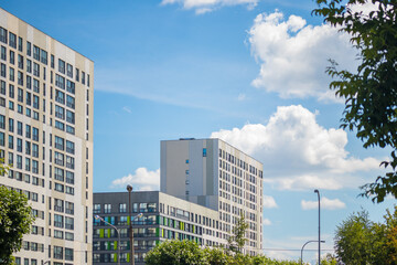 Modern multi-storey houses in summer