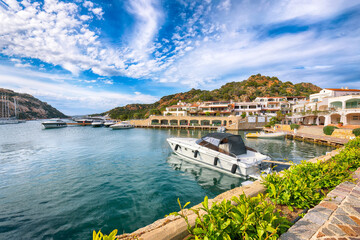 Fototapeta na wymiar Astonishing view of Poltu Quatu port and bay with yachts and motorboats on Costa Smeralda.