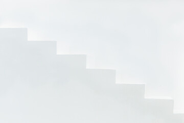 Side view of white concrete stairs and wall minimal style with copy space. Success concept.