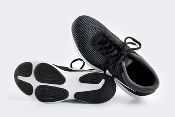 Sport shoes isolated on white background. Black sneakers running shoes. Casual shoes. Youth style. Shoes for fitness, running, yoga.
