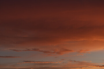 Fototapeta na wymiar Sunset clouds in the sky in summer evening