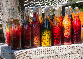 Preserves and tinctures in the sun  - obrazy, fototapety, plakaty