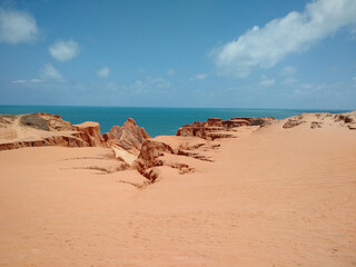 Cliffs at Morro Branco beach, labyrinth and colored sands - Beberibe, Fortaleza, Ceará, Brazil.