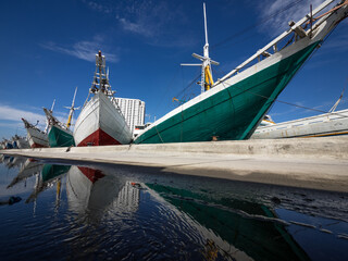 reflection at the puddle of ships at docking yard